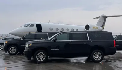 Luxury black car at Dallas Love Field Airport