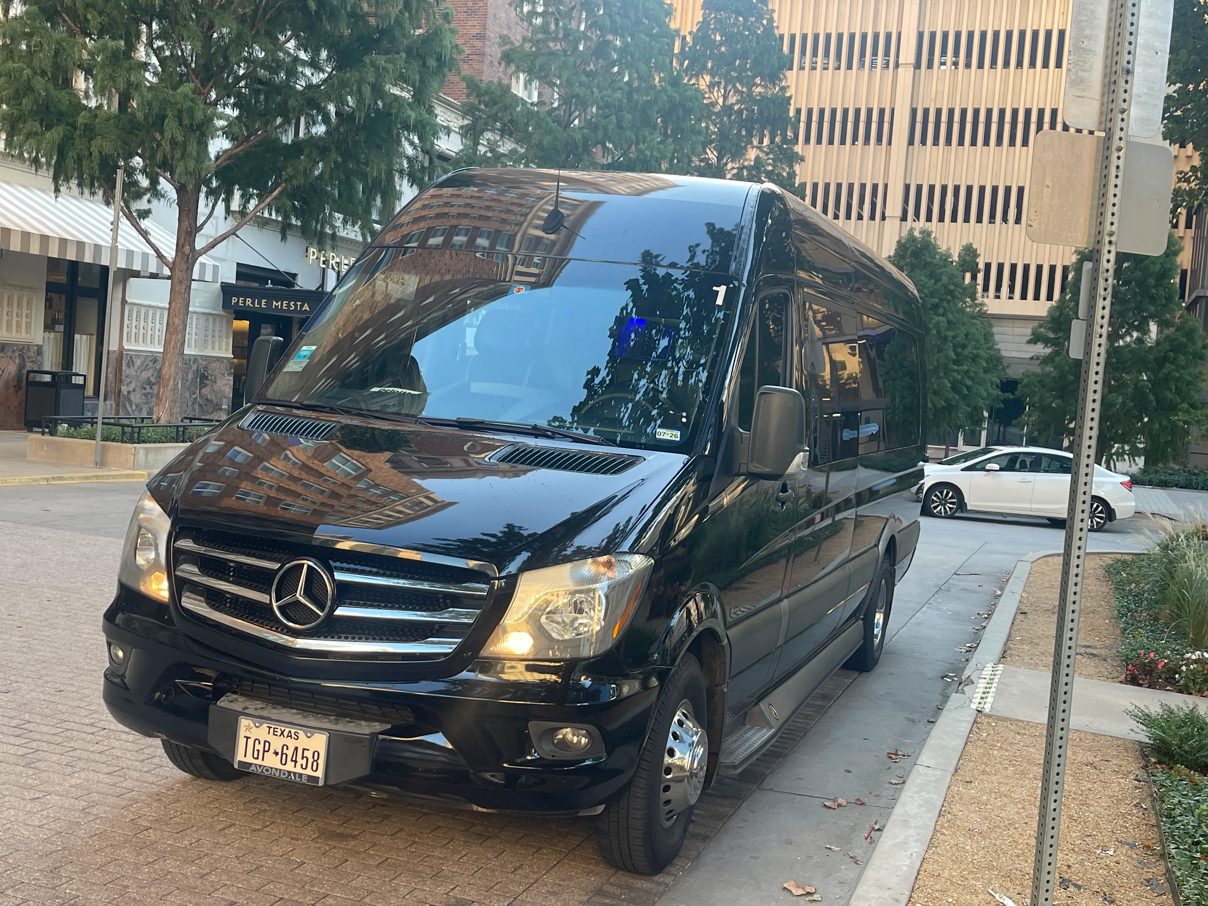 Professional chauffeur for black car service Dallas