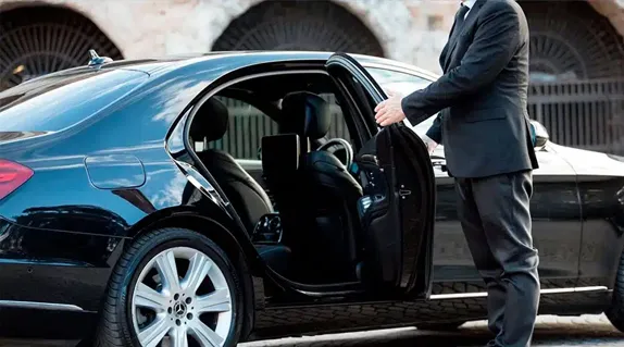 Luxury black car at Dallas Love Field Airport